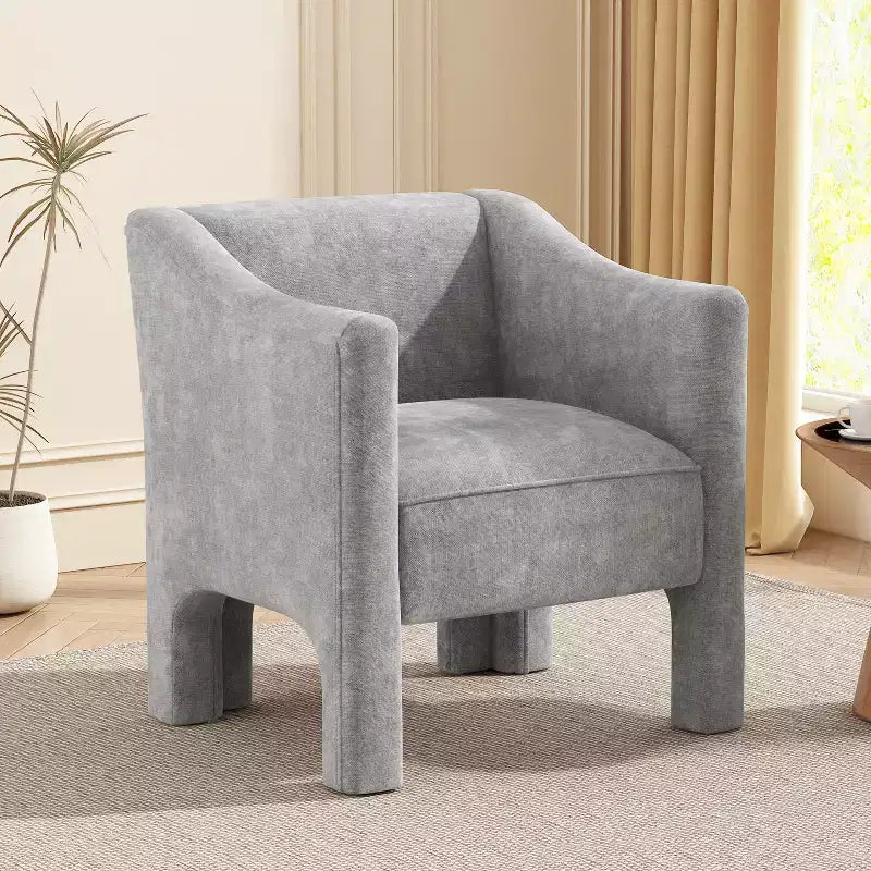 Poltrona di design moderna in ciniglia con schienale avvolgente e braccioli integrati
