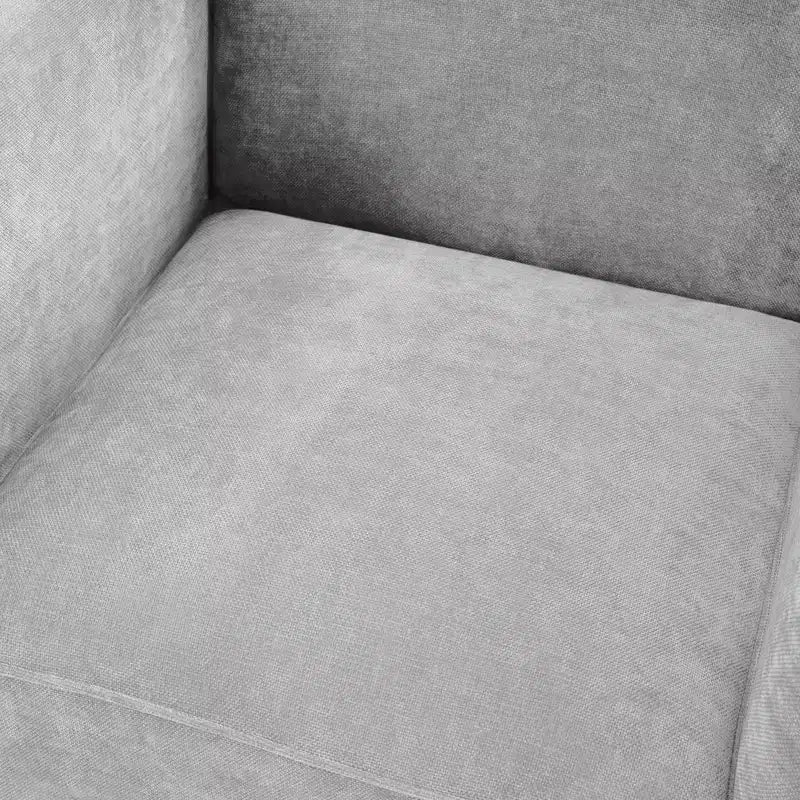 Poltrona di design moderna in ciniglia con schienale avvolgente e braccioli integrati