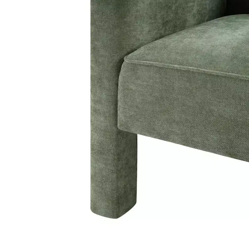 Poltrona di design moderna in ciniglia con schienale avvolgente e braccioli integrati