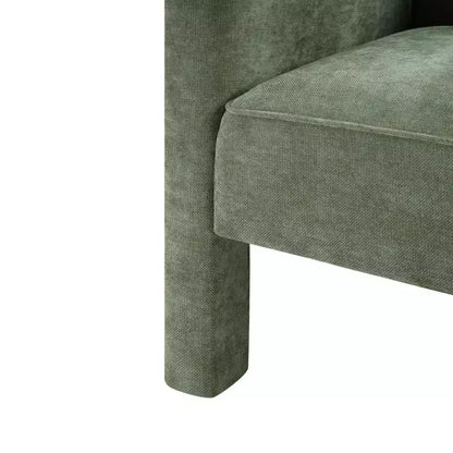 Poltrona di design moderna in ciniglia con schienale avvolgente e braccioli integrati